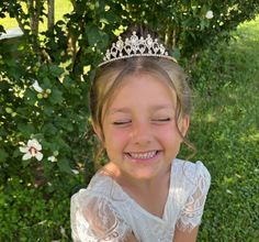 ❤ Please visit my shop for more flower girl accessories! https://www.etsy.com/shop/FromClareWithLove?ref=simple-shop-header-name&listing_id=943292124&section_id=32556451 Flower Girl Rhinestone Crystal Tiara | First Communion Tiara  | Crystal Flower Girl HeadPiece One size fits most ❤There are metal claws, so please be especially careful if the girls are under 15 years old. Tiara Diameter 5 inches Height 1.5 inches Hairstyle With Tiara, Flower Girl Hairstyle, Communion Tiara, Metal Claws, Flower Girl Headpiece, Flower Girl Accessories, Girl Hairstyle, Crystal Tiara, Tulle Flower Girl