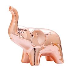 an elephant figurine is shown on a white background