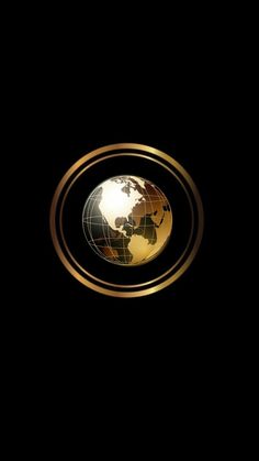 an image of the earth in a golden ring on black background photo with space for text