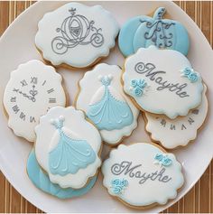 decorated cookies on a plate with the names of their favorite children's name tags