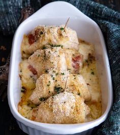 a casserole dish with meat and cheese in it