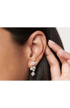 Hand-set clusters of lab-created diamonds stipple these dreamy ear jacket enhancers designed to add a luxurious complement to your studs. Includes two enhancers; studs sold separately   3/4" drop; 3/8" width   Compatible with stud posts up to 0.9mm diameter   Total lab-created-diamond weight: 3.29ct.   Color: G   Clarity: VS   14k gold/lab-created diamond   Imported   >Diamond Guide 7 Stone Diamond Earrings, Daily Use Diamond Earrings, Diamond Statement Earrings, Cluster Diamond Earrings, Diamond Cut Cluster Earrings For Wedding, Wedding Diamond Cut Cluster Earrings, Wedding Lab-grown Diamond Cluster Earrings With Accents, Classic Lab Grown Diamond Cluster Earrings, Elegant Cluster Earrings With Lab Grown Diamonds