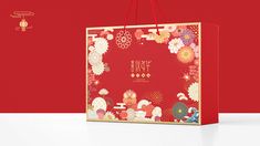 a red shopping bag with the words happy new year written in chinese characters on it