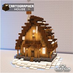 an image of a house made out of wood and stone with the text cartotagrapher house above it