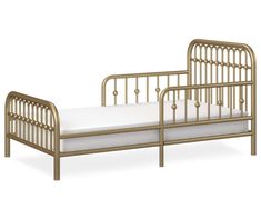 a gold metal bed frame with white sheets on the bottom and side rails, against a white background