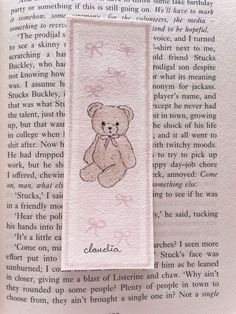 a bookmark with a teddy bear on it