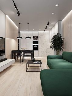 a living room filled with furniture and a flat screen tv sitting on top of a wooden floor