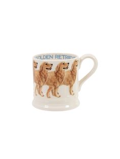 the golden retriever mug is shown on a white background