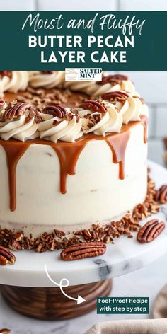 a close up of a cake on a plate with pecans and caramel drizzle