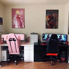 two computer desks with pink chairs and pictures on the wall