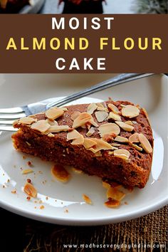 a close up of a piece of cake on a plate with the words most almond flour cake