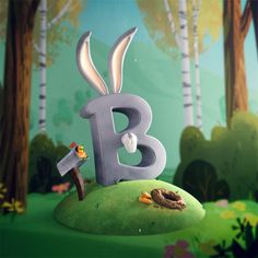 the letter b is placed on top of a green hill in front of some trees