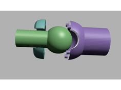 an image of a green ball and purple tube on a gray background with grey backdrop