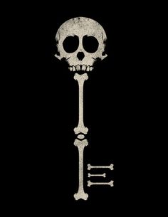 a skeleton key on a black background with the letter e in it's middle