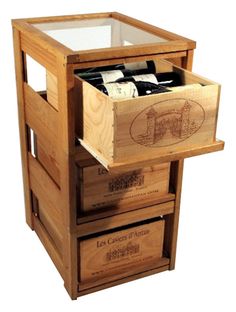 a wooden box with wine bottles in it and two drawers on the bottom that are open