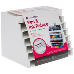 a stack of pens and inks on display in a white cardboard box with pink lettering