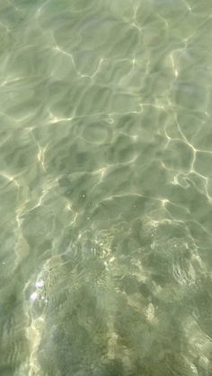 the water is so clear that you can see it's ripples