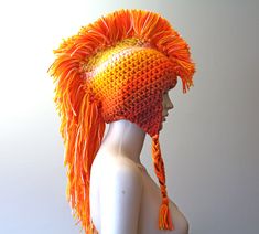 I made this very unique Orange sunset ombre mohawk earflap hat. It has ear flaps and tassels that hang down and a fringe that is long and dramatic Mohawk down the center. It has been crochet with super thick and warm white and earth toned yarn. This bright and visually glowing tuke hat is also double threaded and super warm. It has a lot of punk rock charm and spunk. Anyone is sure to stand out and make a statement in this hat! It's cozy, warm, edgy, and makes a great gift. More colors available Granny Square Tote Bag, Crochet A Granny Square, Granny Square Tote, Sunset Ombre, Earflap Hat, Ear Flap Hats, Orange Hats, Step By Step Crochet, Diy Vetement