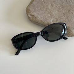 These round oval sunglasses are your everyday classic. Featuring a black frame with smoke lens. This style is unisex. True genuine vintage sunglasses from the 90s.  - 400 uv  - new vintage from the 90s - includes sunglasses pouch  Available in tortoise Doctor Halloween Costume, Black Oval Sunglasses, Sunglasses 90s, Sunglasses Pouch, Black 90s, Style Sunglasses, Oval Sunglasses, Vintage Sunglasses, 90s Style