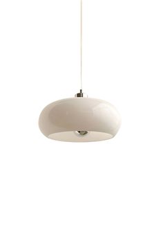 a white light hanging from a ceiling fixture