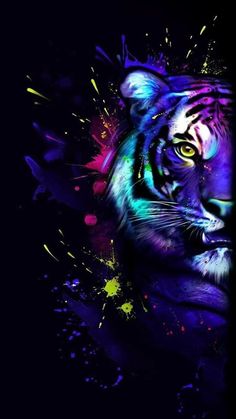 a tiger with colorful paint splatters on it's face