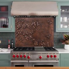 a stove top oven sitting inside of a kitchen next to a wall covered in pots and pans