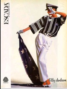 a man in white pants and an american flag is posing for a magazine cover photo