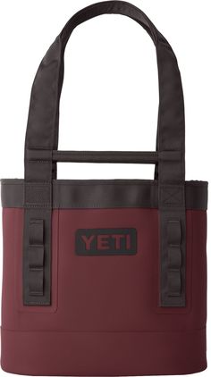 a red and black tote bag with the word yeti on it's side