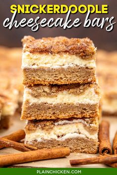 three slices of cheesecake bars stacked on top of each other with cinnamon sticks in the background