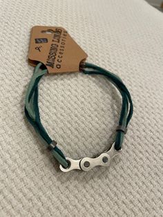 This is an up-cycled Bracelet made from used bike chain links that would have otherwise been thrown away. This is a great accessory for outdoor enthusiasts and anyone that is looking to add something unique to their collection! Bike Chain Bracelet, Bike Chain, Chain Links, Chain Link Bracelet, Link Bracelets, Plein Air, Bracelet Making, Arm Band, Chain Bracelet