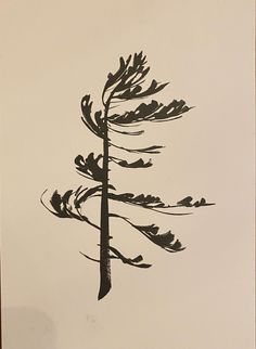 a black and white drawing of a tree