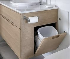 a bathroom with a sink and toilet in it