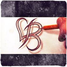 the letter b is drawn on a piece of paper