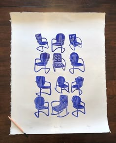 a piece of paper with chairs drawn on it