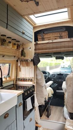 the interior of an rv is clean and ready to be used as a camper