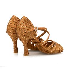 The Paris Gold - Tan Gold-Rhinestones 3.5" Latin and Ballroom Dance Shoes are the epitome of sophistication and comfort for women who want the perfect balance of style and performance. These women’s Latin dance shoes are designed to provide exceptional support while ensuring a sparkling presence on the dance floor. Featuring DTM gold crystal rhinestones, the shoes shine brilliantly from every angle, making them a standout choice for salsa and other Latin dance styles. Known as the Venice in some Fitted Gold Dance Shoes, Gold Heels For Dance, Gold High Heel Dance Shoes For Party, Gold High Heels For Dance, Gold Heels With Bling And Round Toe, Gold Low Heel Dance Shoes For Party, Gold Round Toe Dance Shoes For Formal Occasions, Fitted Gold Dance Shoes For Formal Occasions, Formal Fitted Gold Dance Shoes