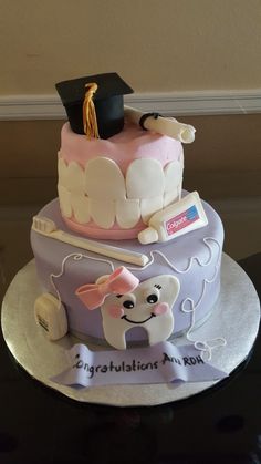 a cake with a graduation cap on top of it