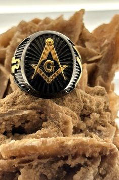 Immerse yourself in the world of Freemasonry with our meticulously crafted rings bearing the symbols of this ancient and respected organization. Each ring is created with attention to detail and respect for the traditions that are the foundation of Freemasonry. *Why choose our rings?* - *Quality and workmanship*: Our rings are made of high quality materials including silver and gold, ensuring longevity and durability. - *Symbolism*: Each ring is engraved with Masonic symbols that carry deep mean Spiritual Etched Ring Jewelry, Symbolic Formal Jewelry With Etched Details, Formal Symbolic Etched Jewelry, Ceremonial Symbolic Black Rings, Symbolic Engraved Open Ring Jewelry, Black Heirloom Ceremonial Jewelry, Black Heirloom Jewelry For Ceremonial Occasions, Black Heirloom Jewelry For Ceremonial Use, Compass Design Ring As A Gift