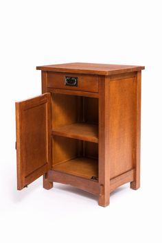 a wooden cabinet with one door open and the other side opened to reveal a drawer