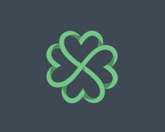 an abstract clover logo on a dark background