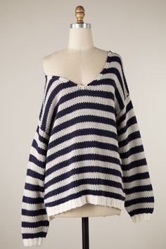 Indulge in luxury with our Striped Fisherman Sweater. This beautiful pull-over features a deep v-neck and slightly oversize fit for effortless elegance. The navy stripe adds a touch of sophistication to this timeless piece, making it a must-have for any wardrobe. Upgrade your style with our premium sweater. Premium Striped Cotton Sweater, Striped Fisherman Sweater, Striped Neck Sweater, Luxury Horizontal Striped Sweater, Obx Dr, Wardrobe Upgrade, Style Bundle, Christmas Board, Slouchy Sweater