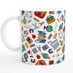 a white coffee mug with colorful school related items on the front and sides, all over it