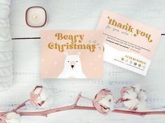 a card with a polar bear on it next to cotton floss and a candle