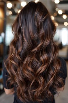 Long hair with a chocolate brown and caramel balayage is trending in 2024. This warm and delicious color blend adds a luxurious and inviting look, perfect for a fashionable and rich balayage style. Balayage Hair Caramel, Balayage Ideas, Hair Dyed, Gorgeous Hair Color, Caramel Hair, Brunette Balayage Hair