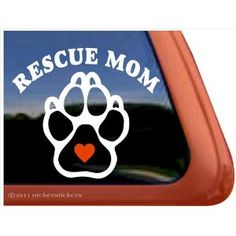 a sticker with an image of a dog's paw that says rescue mom