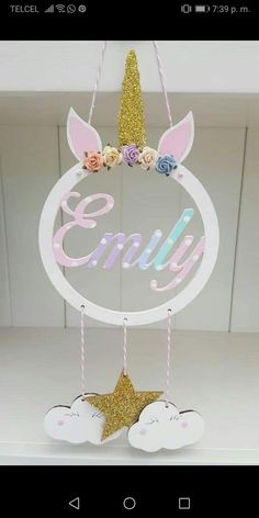 a white wooden sign with pink and blue flowers on it that says,'enjoy '