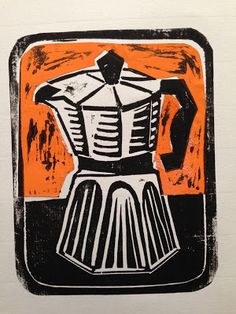 an orange and black square with a drawing of a man's torso on it