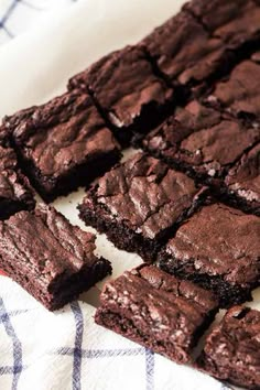 chocolate brownies cut into squares on a towel