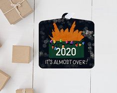 a christmas ornament that says it's almost over