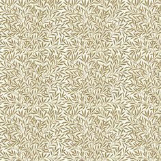 a beige and white wallpaper with leaves on it